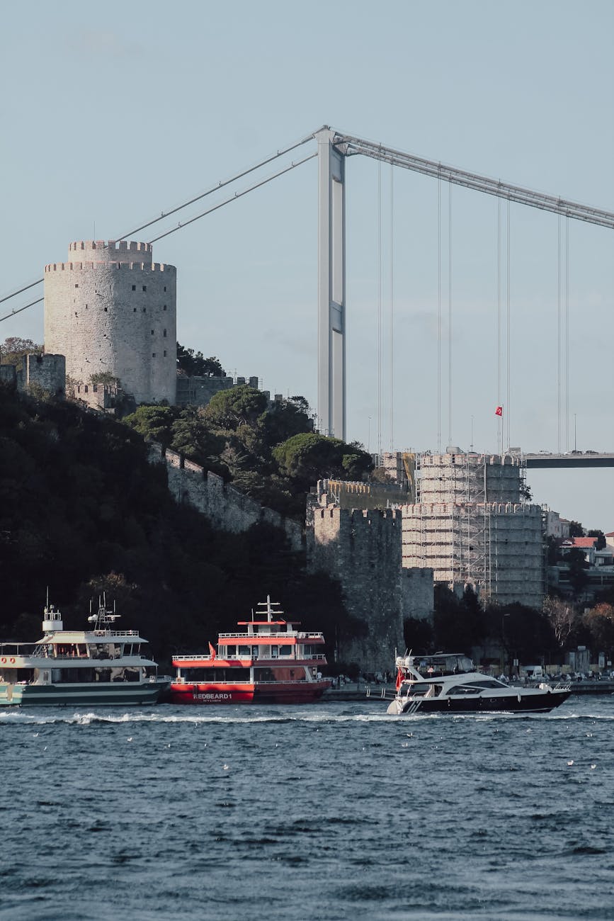boats sailing in bosporus strait near rumeli fortress istanbul turkey